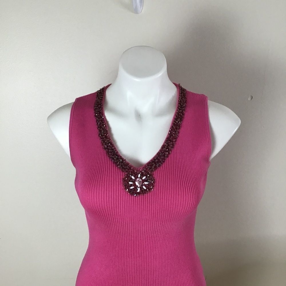 Bellini fuchsia sleeveless sweater with  brown and white beads. Size large